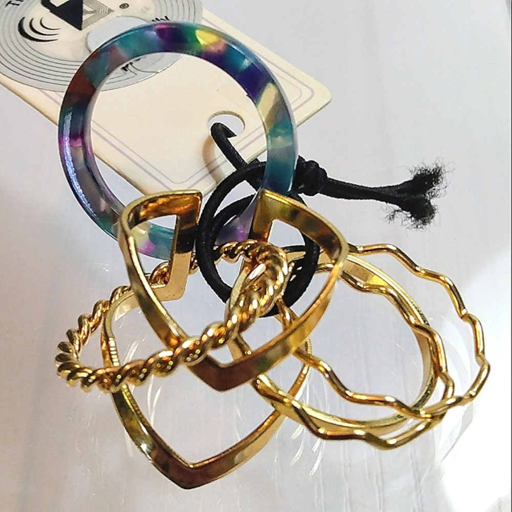 Rand Brothers resin and brass stack rings. Double V ring is adjustable. L(8) NWT